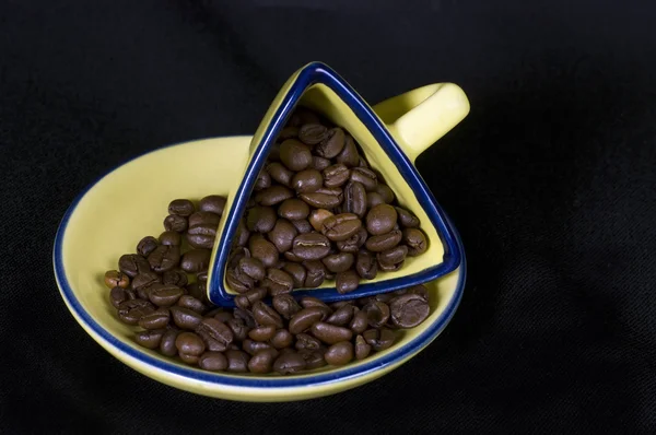 Šálek kávy a fazole Stock Fotografie