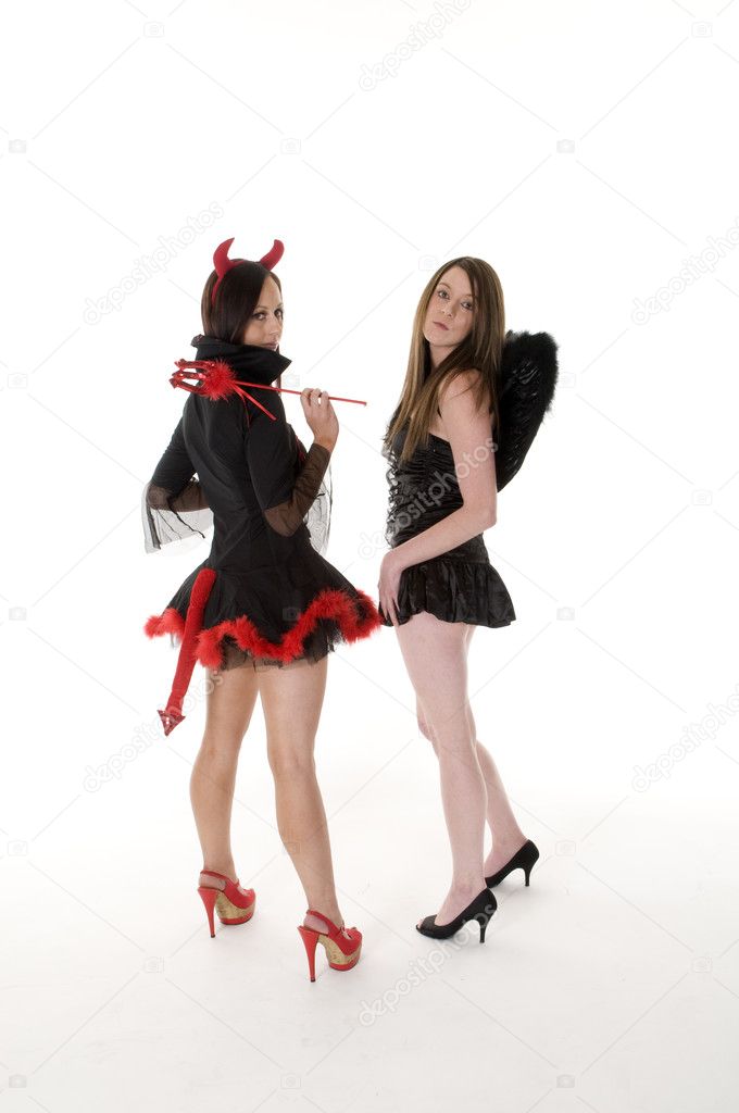 Two sexy girls in Halloween costumes rear