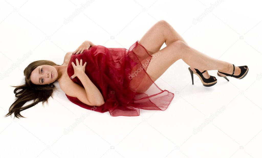 Sexy woman draped in red silk