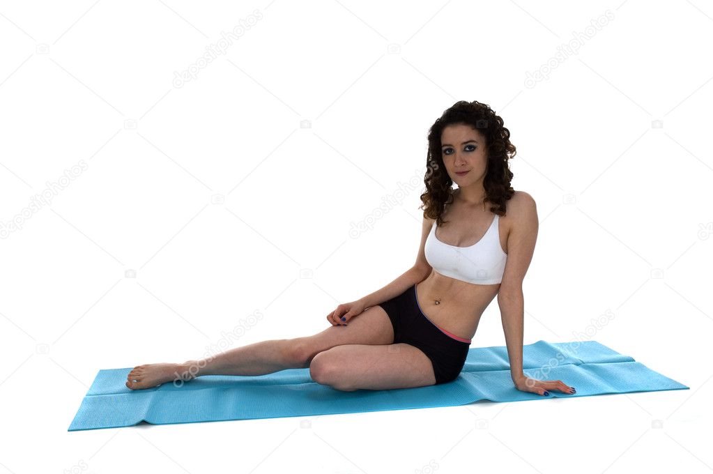 Young Woman on Yoga Mat