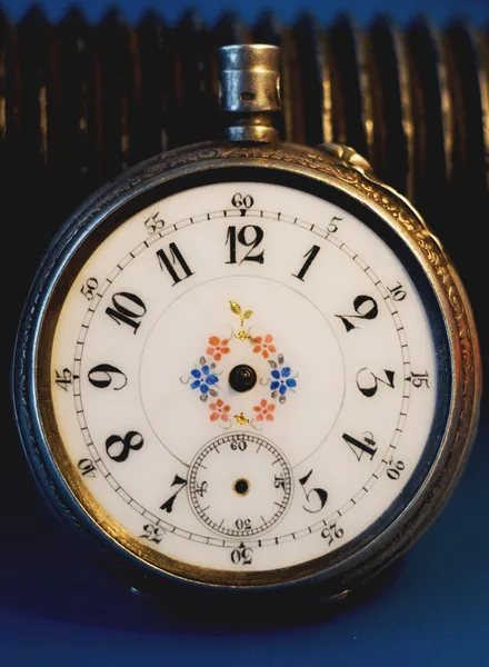 Il vecchio orologio da tasca quadrante Fotografia Stock