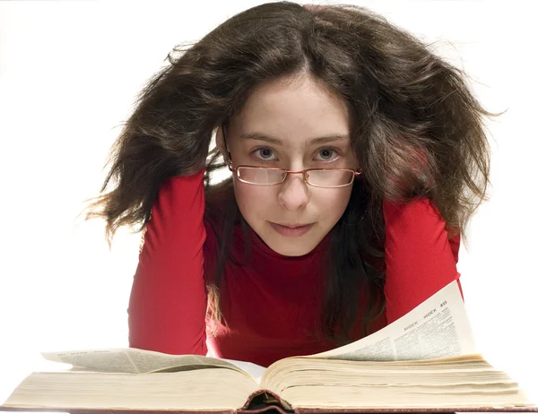 stock image The girl who wears glasses in a red dress