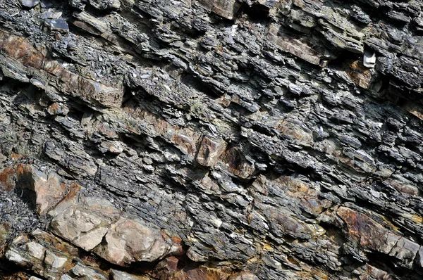 Sedimentární horniny v horách pozadí nebo textury — Stock fotografie