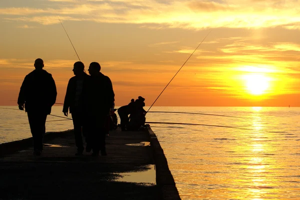 Fishermen and sunset — Stock Photo, Image