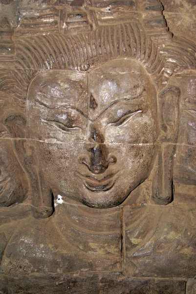 Duvar ve Buda'nın yüzü — Stok fotoğraf