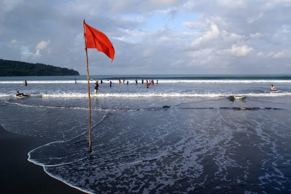Flagga på stranden — Stockfoto