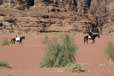 Men on horses clipart