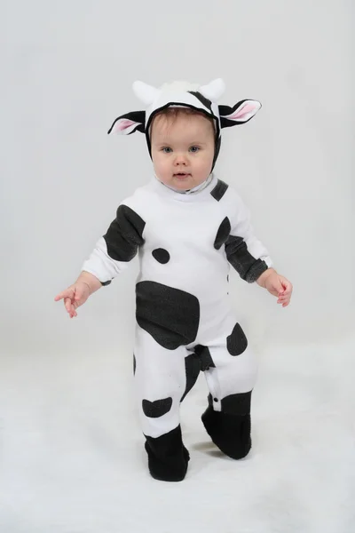 stock image Infant girl in cow costume isolated on white