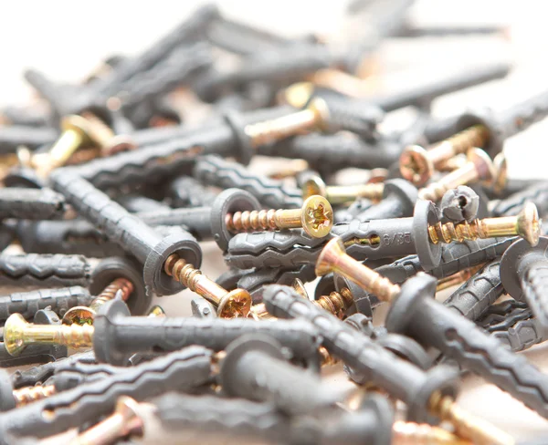stock image Screws with dowels on the floor. Close-up