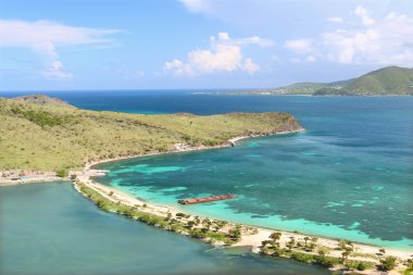 Beautiful beach on Saint Kitts clipart