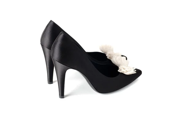 Černé ženy boty s bílými uzel — Stock fotografie