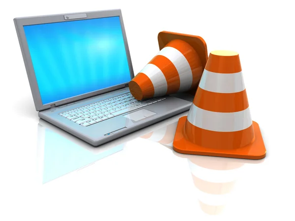 Laptop e cones de tráfego — Fotografia de Stock