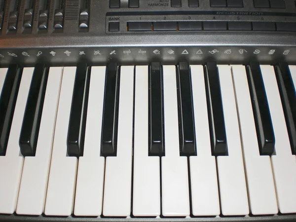 The keyboard and synthesizer buttons close up. — Stock Photo, Image