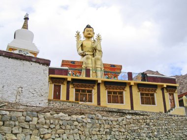 Ladakh, India, a monastery of Likir, sitting Buddha Maytreya. clipart