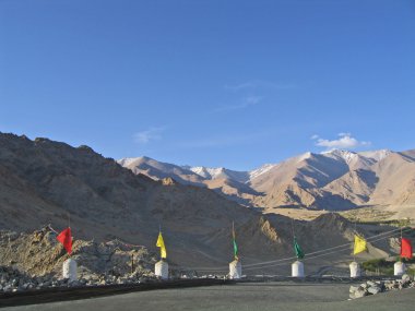 Ladakh, India, capital Leh, a protection with tags against mountains. clipart