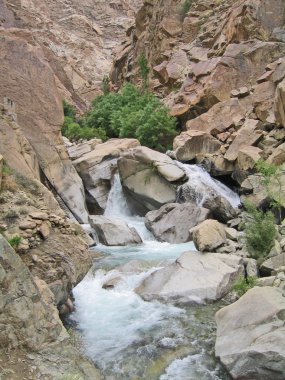 Ladakh, India, valley Indus, river Ind inflow by small falls. clipart