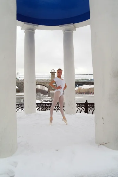 stock image The ballerina in the Rotunda dances ballet in the winter on snow