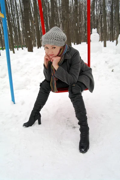 Girl Sits Children Swing Park Winter Moscow Russia — Stock Photo, Image