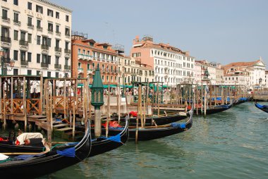 Venice harbour with gondolas clipart