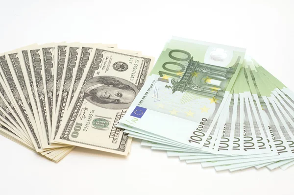 stock image Many Euro and Dollars on white background