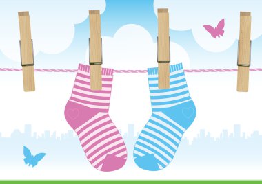 Vector illustration of a line with clothespins and baby socks. clipart