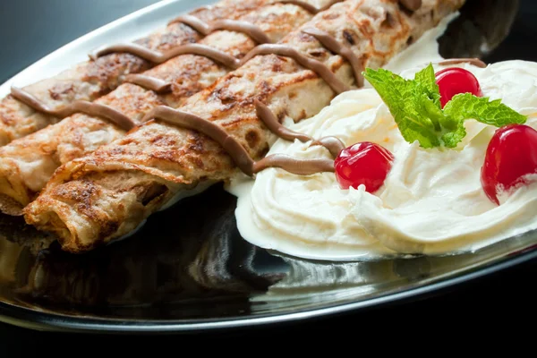 stock image Pancakes with cream and chocolate