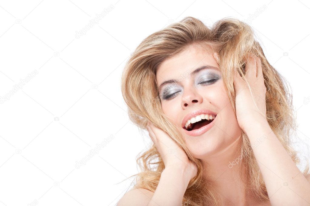 Happy satisfied blonde woman with closed eyes