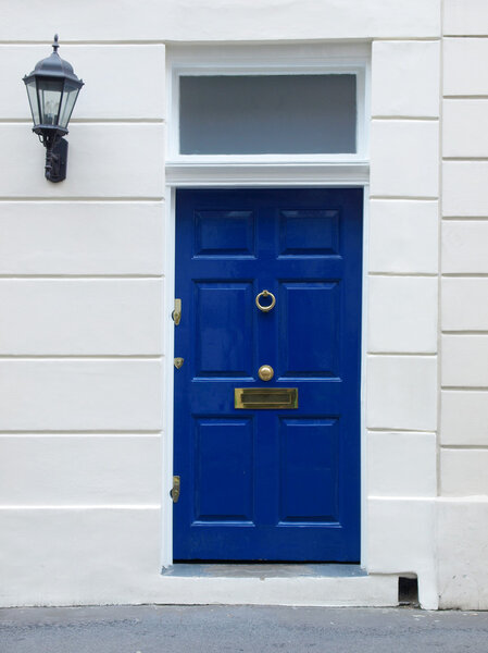 Brightly coloured traditional English house door in London