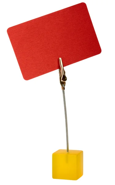 Rött kort med metall klipp — Stockfoto