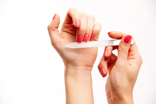 Vrouw handen en manicure — Stockfoto