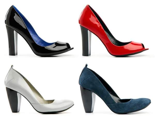 Cuatro zapatos de tacón alto femeninos — Foto de Stock