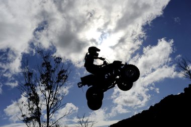 quad bike jumping  clipart