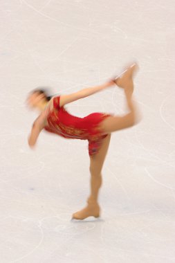 female ice-skater in action clipart