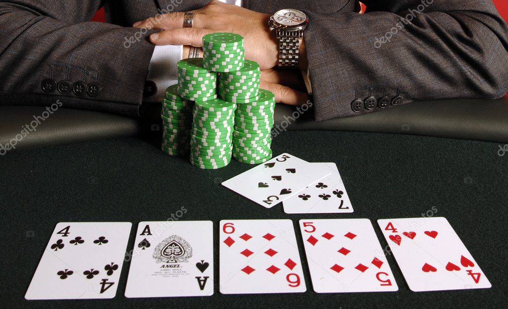 poker player with cards and chips