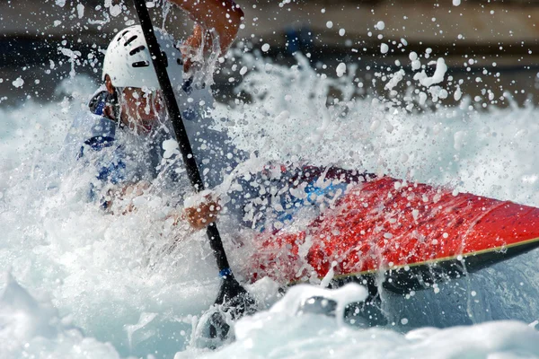 Male kayaker races down — Stock Photo, Image