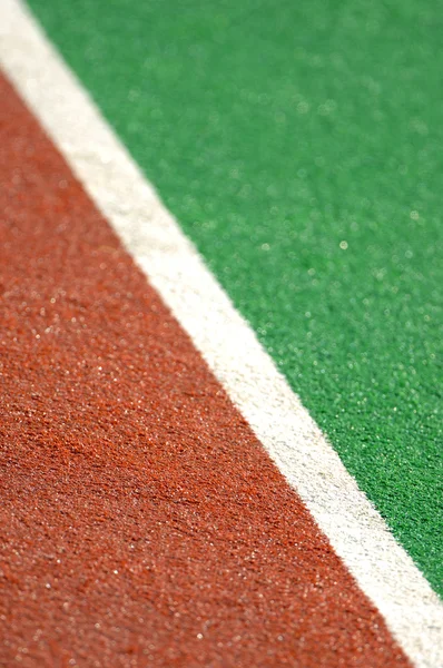 Track and field with artificial turf — Stock Photo, Image