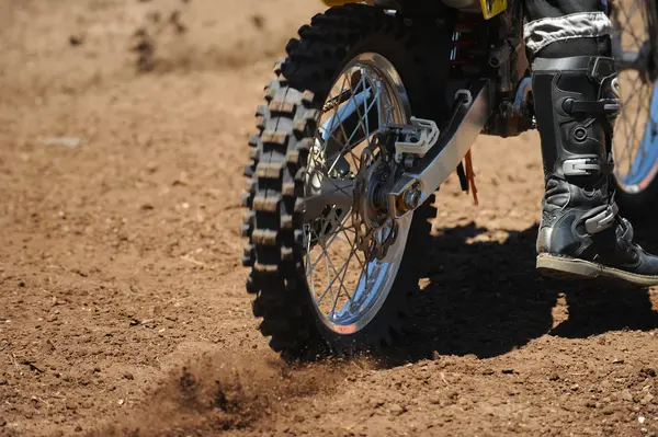 Motorbike tyre on dirt track — Stock Photo, Image