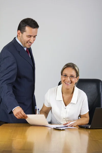 stock image Smiling businesswoman and businesman