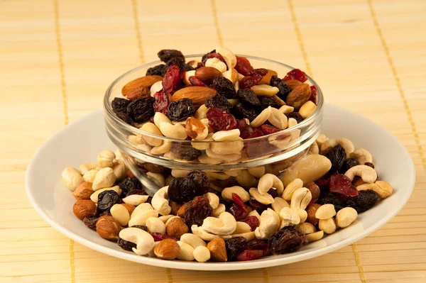 stock image Cup of a variety of tropical dried fruits including nuts and raisins