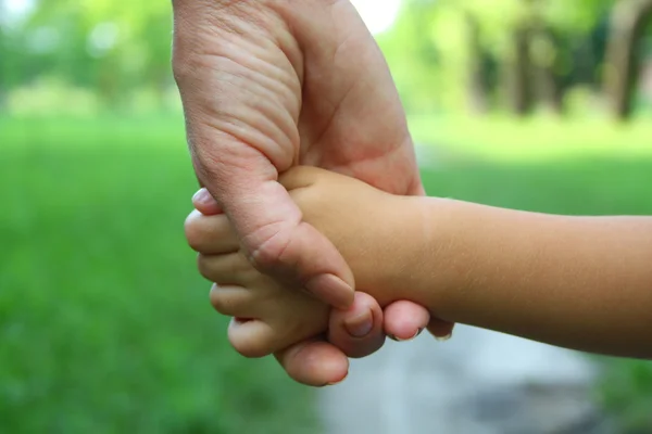 stock image Mother and child holding hand