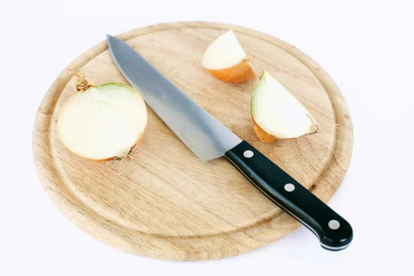 stock image Cut onion on wooden board