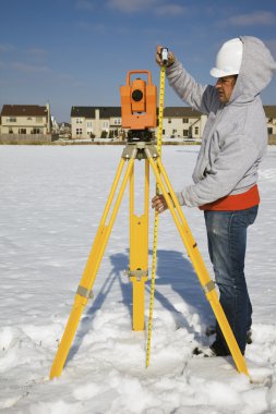 Measuring height of theodolite clipart
