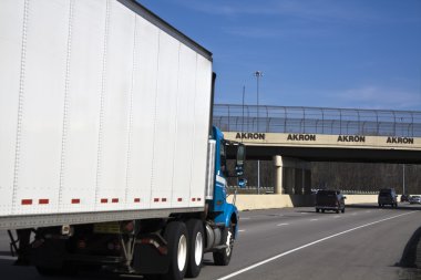 White Truck entering Akron clipart