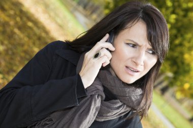 Surprised girl on the phone clipart