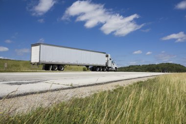 White Semi on the road clipart