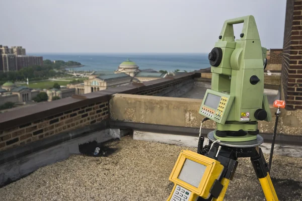 Theodolite on the rooftop — Stock Photo, Image