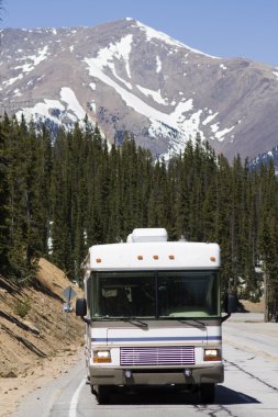 RV driving the mountains clipart