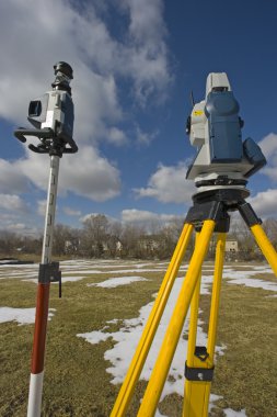 Surveying during winter time clipart