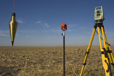 Total station, prism and plumb-bob clipart