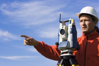 Land Surveyor in the field clipart